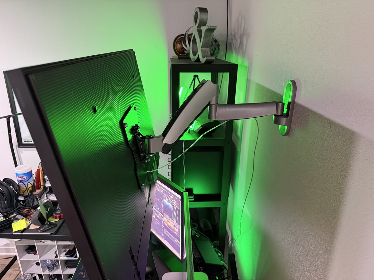 Samsung 43 inch Frame TV wall mount arm showing full articulation